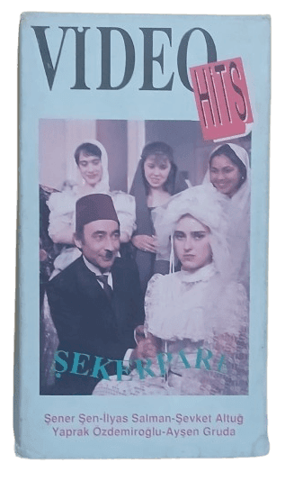 şeker1-removebg-preview Şekerpare VHS Kaset (Çok Nadir) - Görsel 1